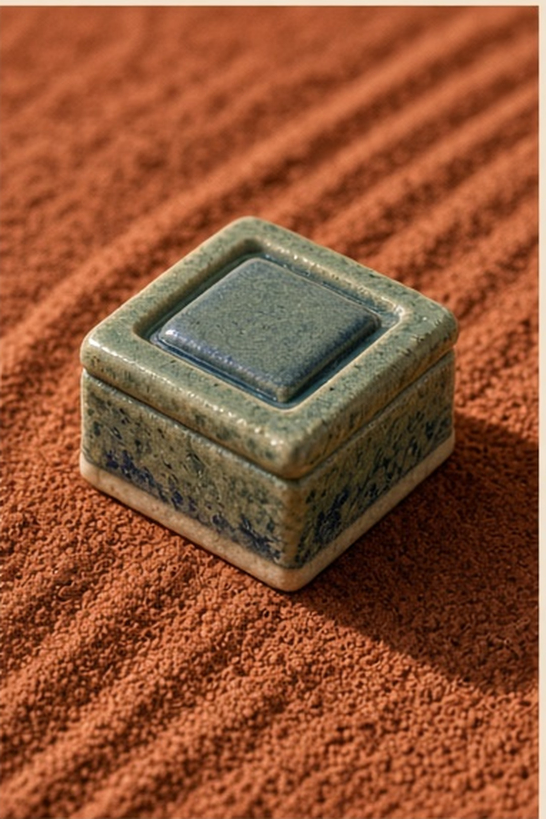 A rake clearing every tile from clay
